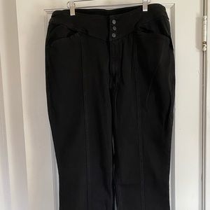 Free People CRVE button up flared denim jeans.